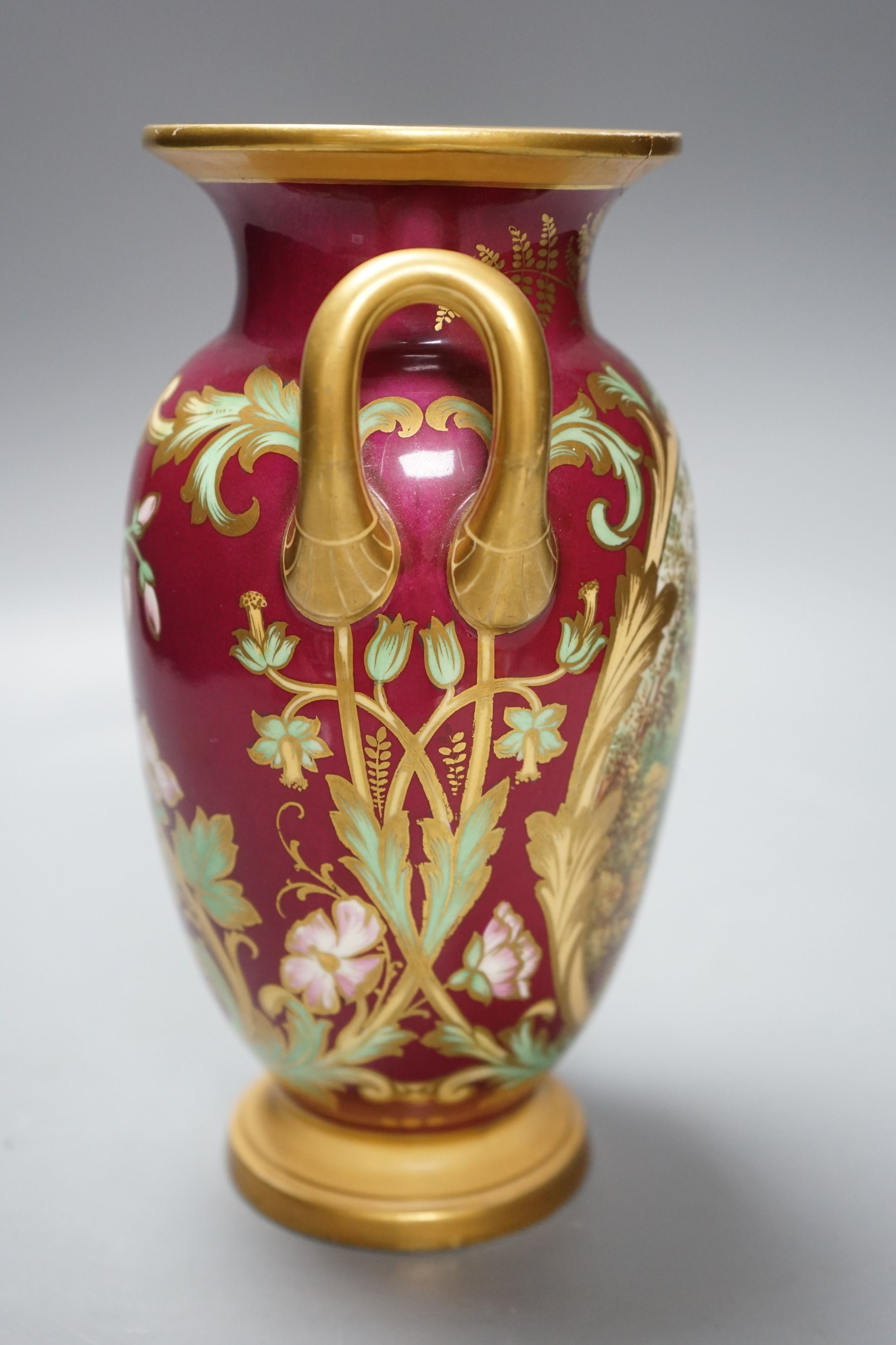 A 19th century English bone china two handled vase, decorated with a central cartouche, in distinctly signed on base, 21.5cms high